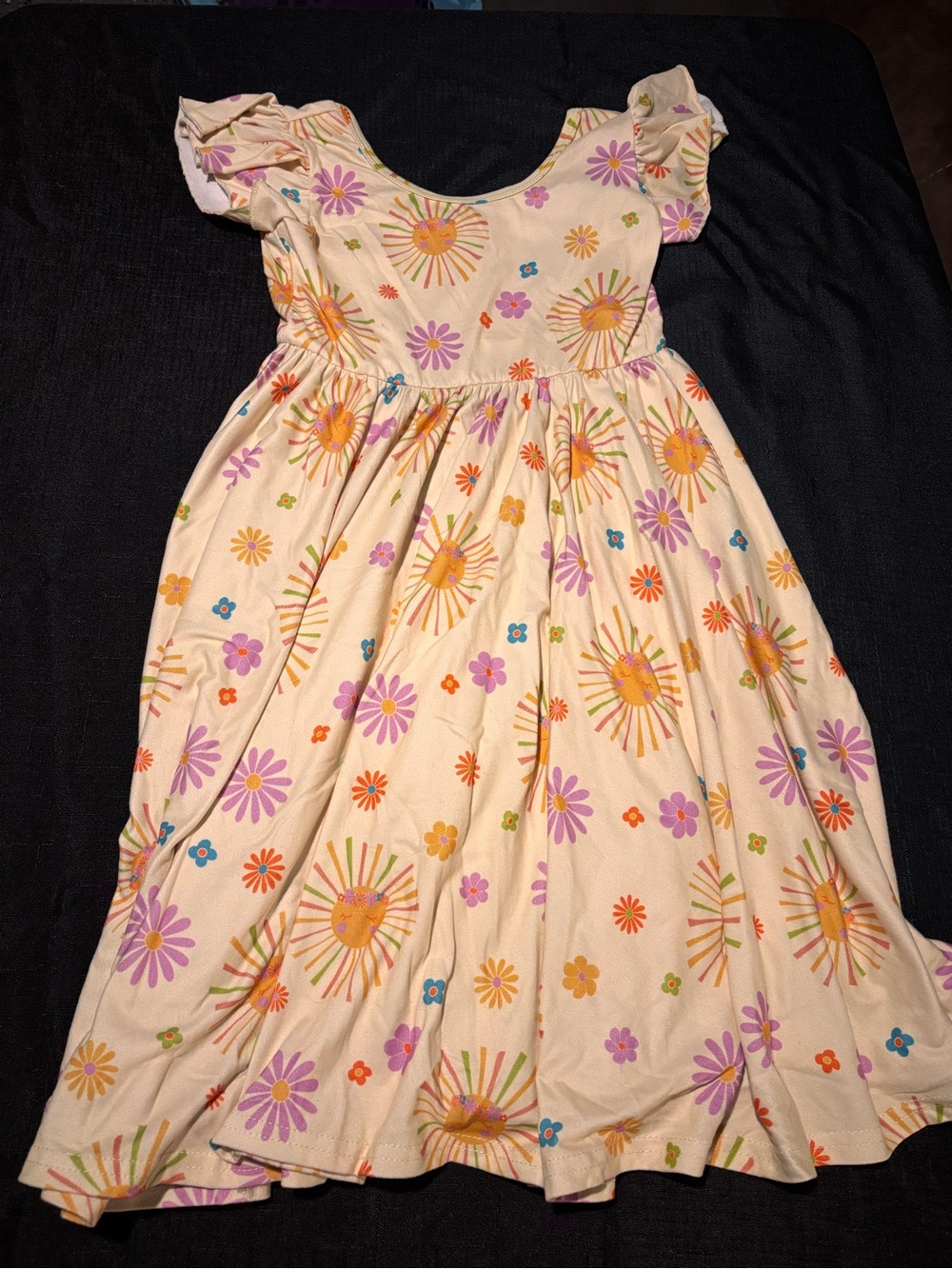 Dot Dot Smile Cream Dress with Yellow Sunbursts & Purple Flowers